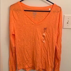 Orange long sleeved shirt